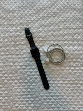 Apple Black Sport Smartwatch with Black Ventilated Band and Charging Cable